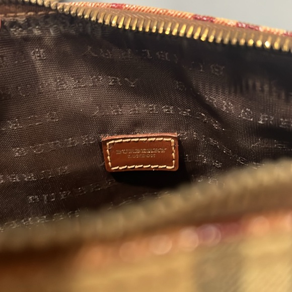 Selling my used Burberry tote bag. Some wear and tear by the handles. - Picture 3 of 6